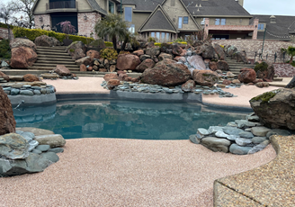 Custom Swimming Pool, Natural Rock Features, Safety Surfacing
SunPlay
Sundek
