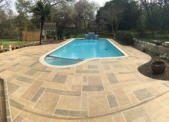 Colored concrete around a pool deck